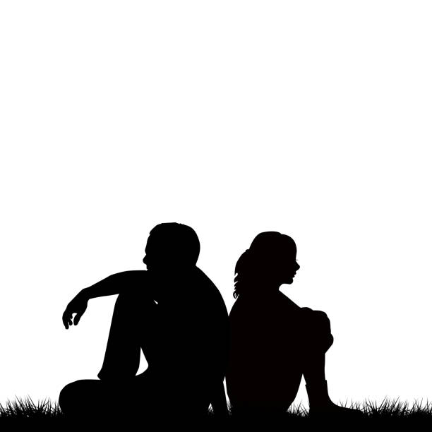 Silhouettes of sad couple sitting back to back Silhouettes of sad couple sitting back to back divorce silhouettes stock illustrations