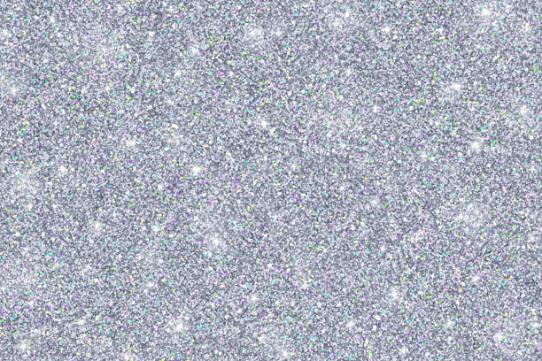 Silver glitter texture Glitter texture of silvery color, abstract silver background silver colored stock illustrations
