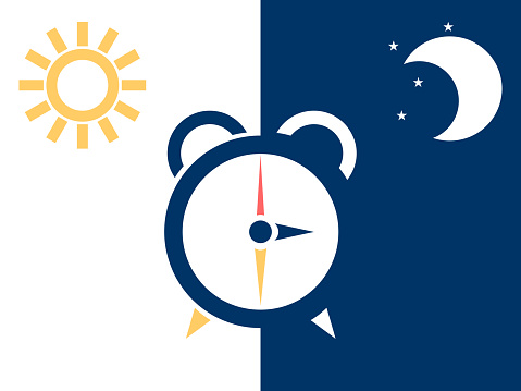 Simple conceptual vector illustration of an alarm clock - Day and night change.