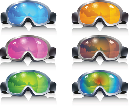 Ski glasses in different colors with mirror images of mountains