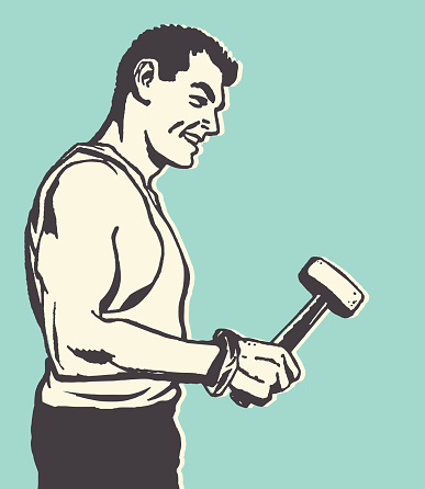 Smiling Strong Man Holding a Hammer