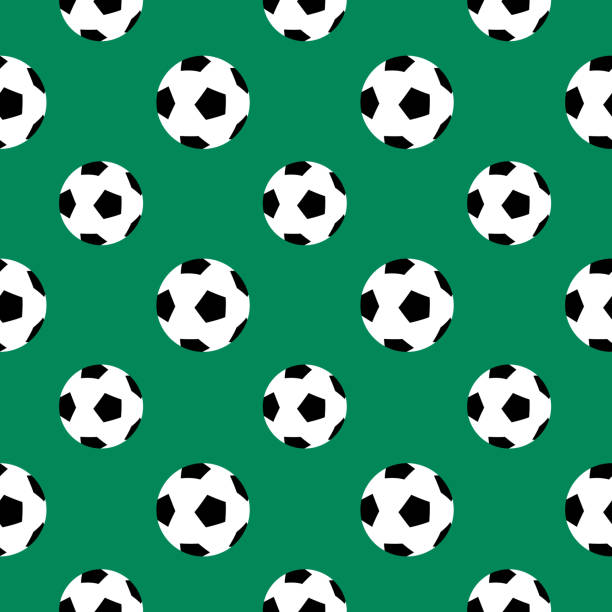 Soccer Ball Seamless Pattern Vector illustration of soccer balls on a green background. soccer patterns stock illustrations