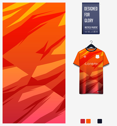 Soccer jersey pattern design.  Abstract pattern on orange background for soccer kit, football kit or sports uniform. T-shirt mockup template. Fabric pattern. Abstract background.