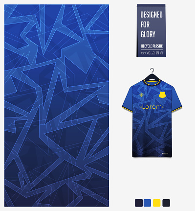 Soccer jersey pattern design. Geometric pattern on blue background for soccer kit, football kit or sports uniform. T-shirt mockup template. Fabric pattern. Abstract background.