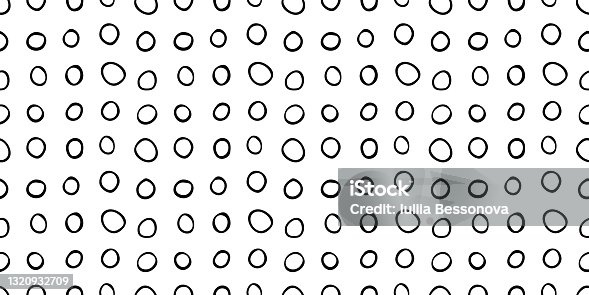 istock Spotty abstract vector seamless pattern. Random rings, dots, circles, spots, stains, bubbles, stones in row. Design for fabric, funny cute print. Repetitive graphic background and texture 1320932709