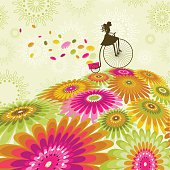 Girl silhouette biking on a flower field. Layered file for easy edition.