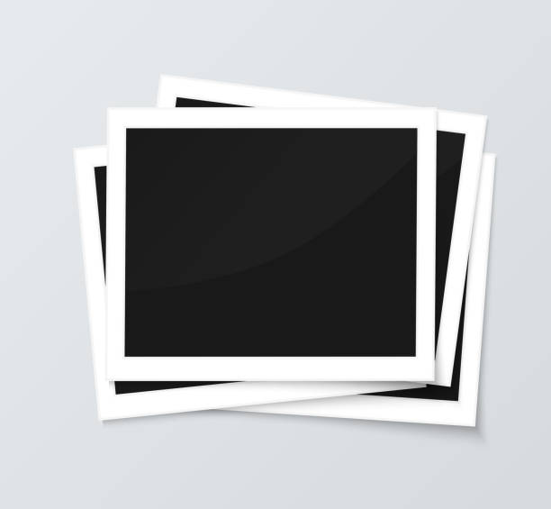 Stack of blank horizontal photo frames from instant camera with Stack of blank horizontal photo frames from instant camera with shadow isolated on gray background for images. Realistic vector illustration of photo frame with space for images and photos. Photo frame vector stack photos stock illustrations