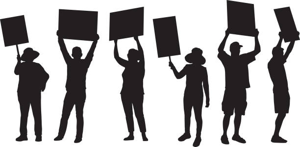 Standing Protester Silhouettes Vector silhouette of six standing people holding up protest signs. protestor stock illustrations