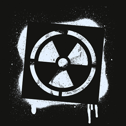 Stencil radioactive sign. Radiation hazard. White graffiti print on black background. Vector design street art