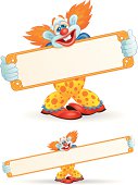 Clown holding growing sign.