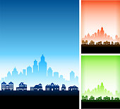 Suburbs Cityscape with Modern City Skyline Vector Background. This royalty free vector illustration features a silhouette of residential buildings and homes in the foreground with a cityscape set in the background. The image includes three variation, the main one in blue with alternate version in red and in green on the right. Each house or building can be used independently. There is also plenty of space for copy. Architectural details such as doors and windows make this a perfect option for your neighborhood announcements.