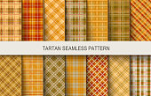 Tartan seamless vector patterns in brown and orange colors. Vector illustration