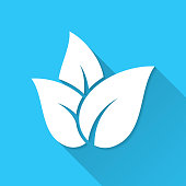 istock Tea leaves. Icon on blue background - Flat Design with Long Shadow 1351237397