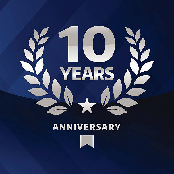 Ten years Anniversary emblem Vector of silver grey anniversary emblem for ten years with blue background. anniversary symbols stock illustrations