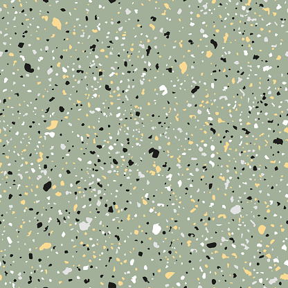 Terrazzo seamless vector pattern with white, grey, orange and black chunks on green background.