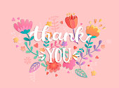 Thank You handwritten inscription with flowers. Vector illustration of hand drawn lettering.