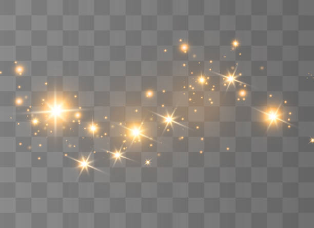 The dust sparks The yellow dust sparks and golden stars shine with special light. Vector sparkles on a transparent background. Christmas light effect. Sparkling magical dust particles. glitter stock illustrations
