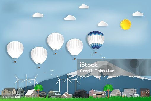 istock The hot air balloons travel over Fuji mountain in Japan and countryside on blue sky as trip in the holiday , paper art and craft style concept. vector illustration. 1024193430