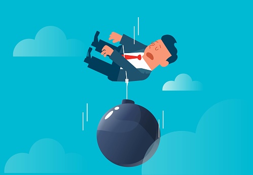 The sleeping businessman was pulled together by a huge iron ball and fell from high in the sky