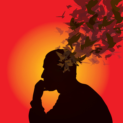 Thinking man with birds over his head