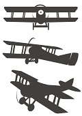 Three classic propeler biplane silhouetes for design purposes. Easy to change colors. 