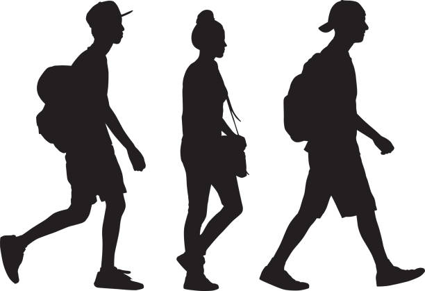 Three Teens Walking Silhouette Vector silhouette of three teens walking together in a row. teenagers stock illustrations