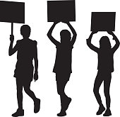 Vector silhouette of three young girls protesting.