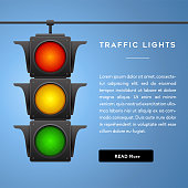 Traffic lights with all three colors on hanging.