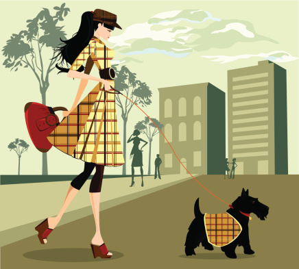 Trendy Young Woman Walking Her Dog Through City