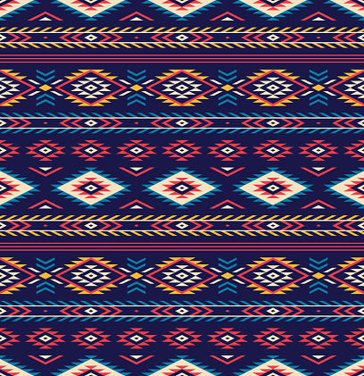 Tribal pattern vector. Multicolored aztec native background. Seamless navajo boho style stripes decorative ornament for trousers, shorts, bag, or other textile and paper print.