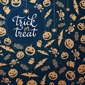 The gold colored decoration elements for the night party of Halloween on the spider web backgrounds