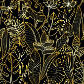Tropical flowers and plants seamless pattern. Floral gold wallpaper on black background.