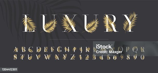 istock Tropical latin font with gold leaves and branches of palm trees, letters and numbers luxury typeface for the design of wedding and greeting invitations 1354412301