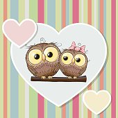 Two Owls on a background of heart