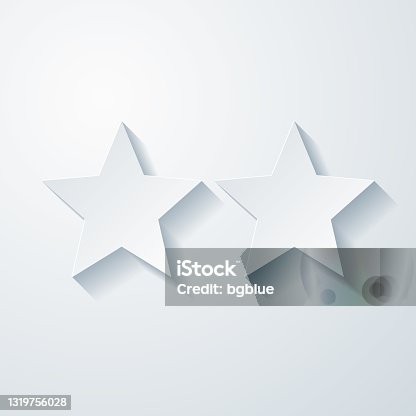 istock Two stars. Icon with paper cut effect on blank background 1319756028