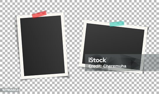 istock Two vintage photo frames with adhesive tape on transparent background. 921956552