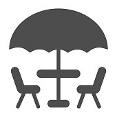 istock Umbrella and table with chairs solid icon, Coffee time concept, street cafe sign on white background, table with umbrella for terrace icon in glyph style for mobile, web. Vector graphics. 1263985334