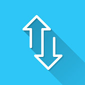 istock Up and down transfer arrows. Icon on blue background - Flat Design with Long Shadow 1350372853