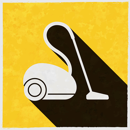 Vacuum cleaner. Icon with long shadow on textured yellow background