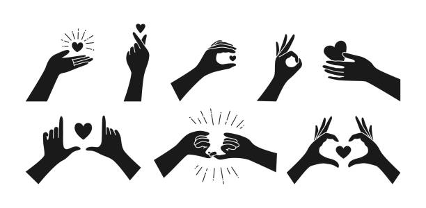 Valentine black silhouette icon set hand heart Valentine black silhouette icon set, hand holding heart. Finger love symbol, Hands gestures Korean love sign. Minimalist trend style. Design print greeting card, vector illustration isolated hand silhouettes stock illustrations