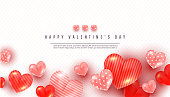 Valentines day greeting card or congratulation with 3D love heart shapes of different sizes and text on a white background