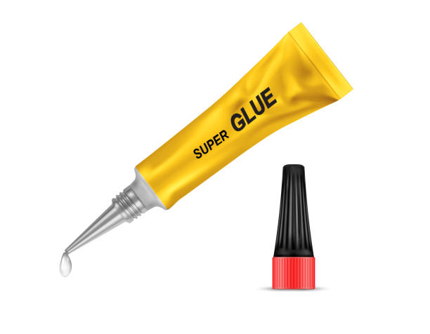 Vector 3d realistic metal tube of super glue Vector realistic yellow metal tube of super glue, with open black lid and with liquid drop at a tip, isolated on background. Container with adhesive for any purpose. Mockup for package design glue stick stock illustrations