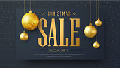 Vector banner template for Christmas sale. The design of the header with a black background, gold text and Christmas balls floating in the air.