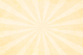 Vector illustration of grunge  beige coloured sunburst. Alternate stripes of light brown and slightly dark shade. Alternate color stripe pattern of beige, cream, creme, off white color, narrow towards the middle and broad towards the edge. No text. No people. Blotched. Blotchy. Blotches. Smudged. Color gradient.