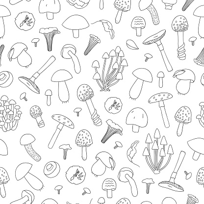 Vector seamless pattern of black and white mushrooms