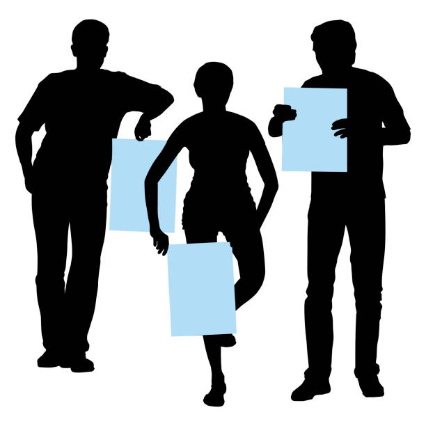 Vector silhouettes of a group of people a slim girl and two tall young men holding posters in their hands a place for text. Vector silhouettes of a group of people a slim girl and two tall young men holding posters in their hands a place for text newspaper silhouettes stock illustrations