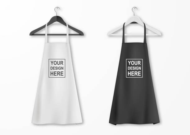 Vector white and black cotton kitchen apron set with clothes hangers closeup isolated on white background. Design template, mock up for branding, advertising etc. Cooking or baker concept Vector white and black cotton kitchen apron set with clothes hangers closeup isolated on white background. Design template, mock up for branding, advertising etc. Cooking or baker concept. apron stock illustrations