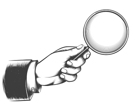 Victorian man hand with magnifying glass