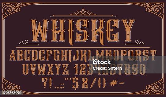 istock Vintage decorative typeface on dark background 1205568090