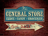 Vector illustration of a vintage, retro, old fashioned General Store wood sign hanging on a brick wall. Light blue, cream and red color scheme. Antique Signage, with text design. Fudge, Candy, Groceries. Open daily. Old fashioned nostalgia, printable. Store, shopping, antique, old days. Wall signage. Fully editable and printable. Arrow design.